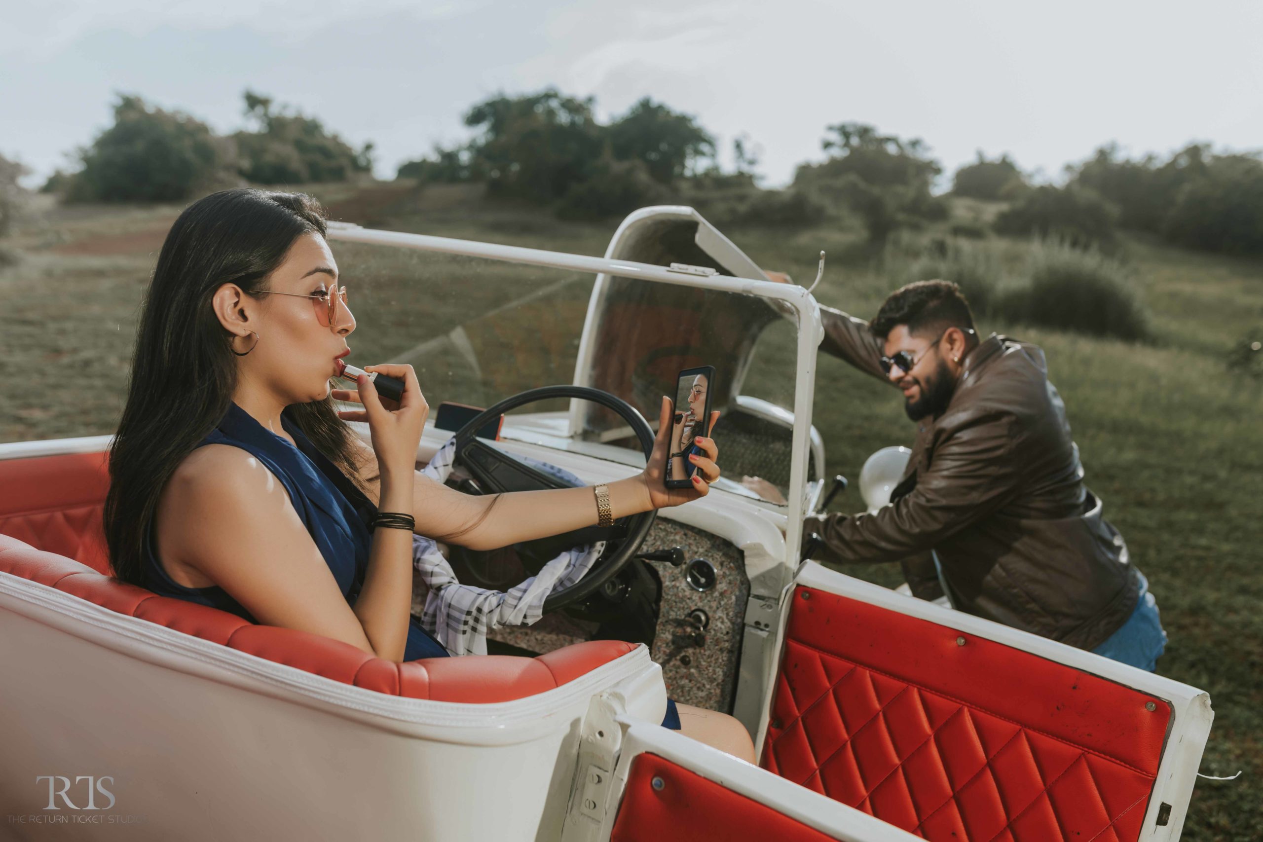 beautiful couple in the vintage car in the goa Beautiful candid photography of pre wedding and wedding by The Return Ticket Studios 