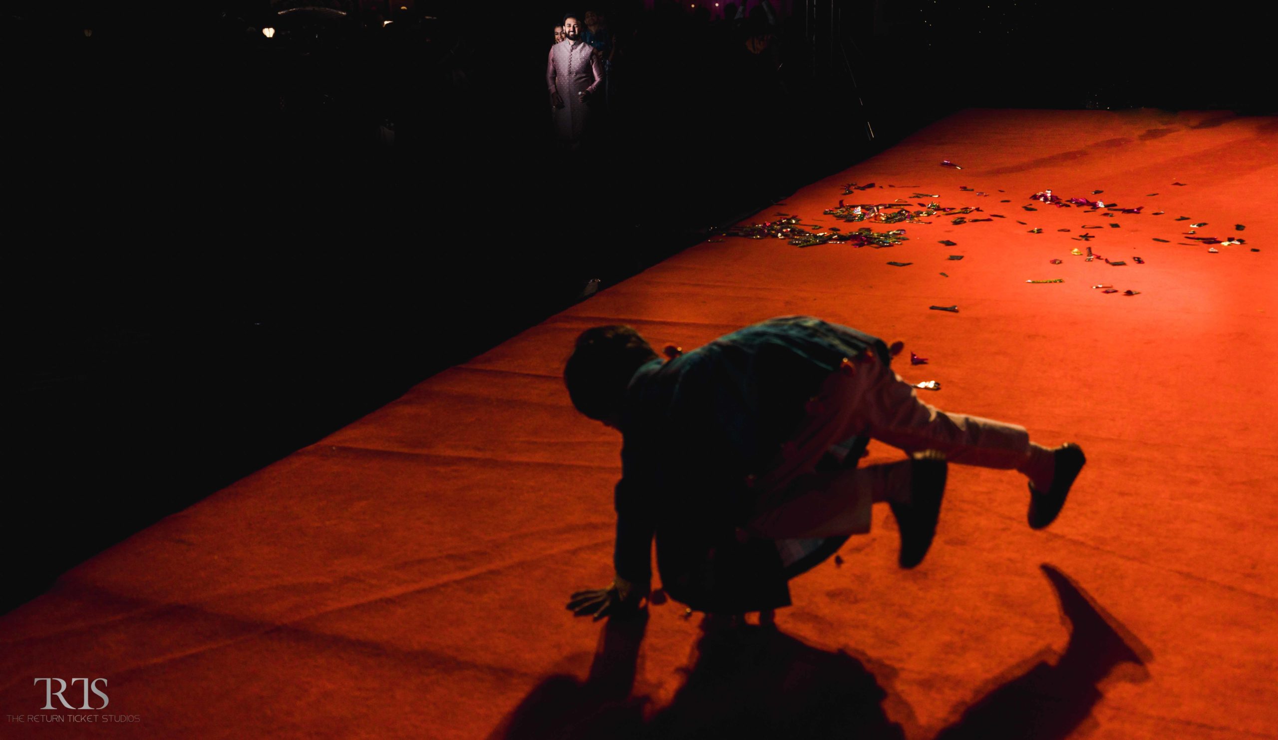 kid dancing in the sangeet ceremony Beautiful candid photography of pre wedding and wedding by The Return Ticket Studios 