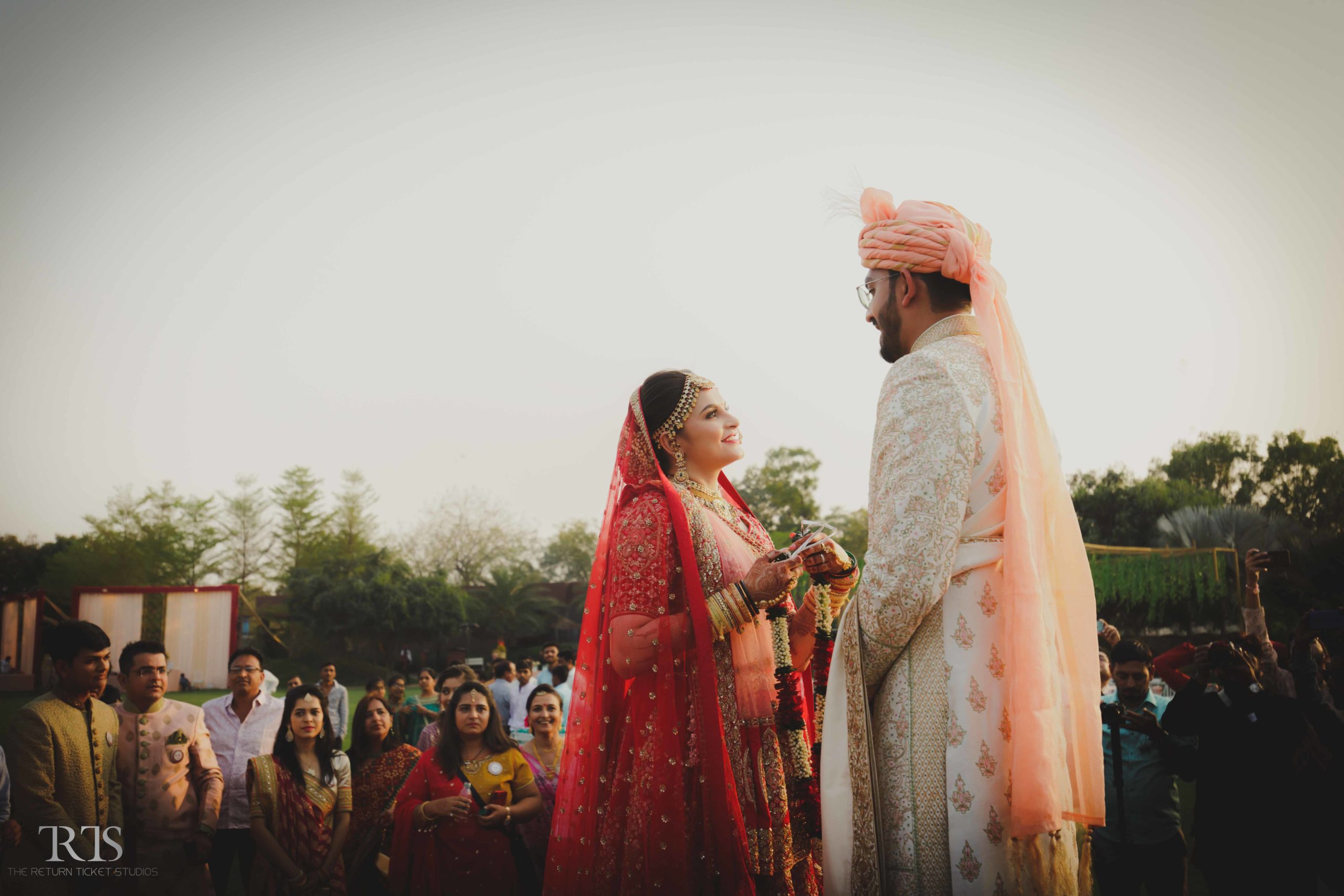 var mala scene of bride and groom Beautiful candid photography of pre wedding and wedding by The Return Ticket Studios 