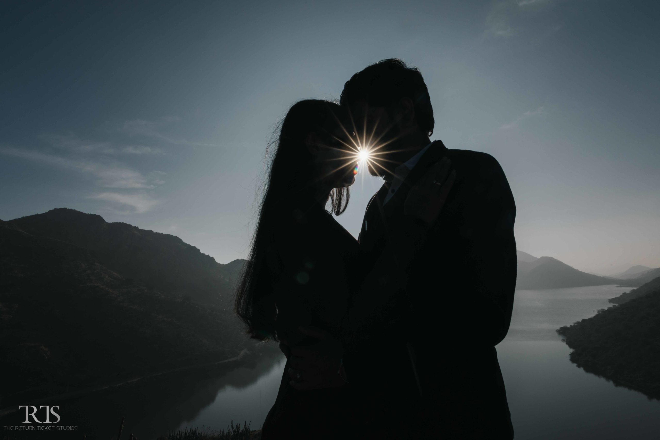 beautiful silhouette shot on the badi lake Beautiful candid photography of pre wedding and wedding by The Return Ticket Studios  